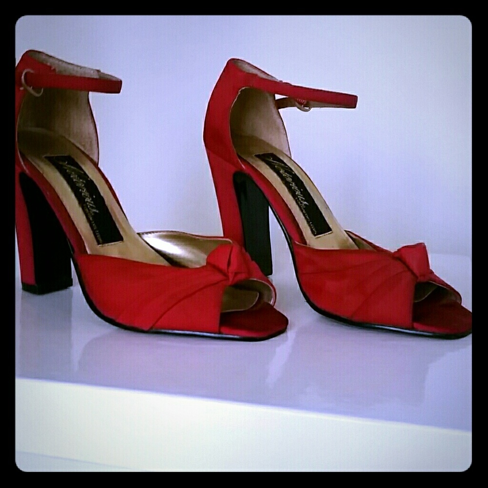 Notorious red high heeled ankle strap.